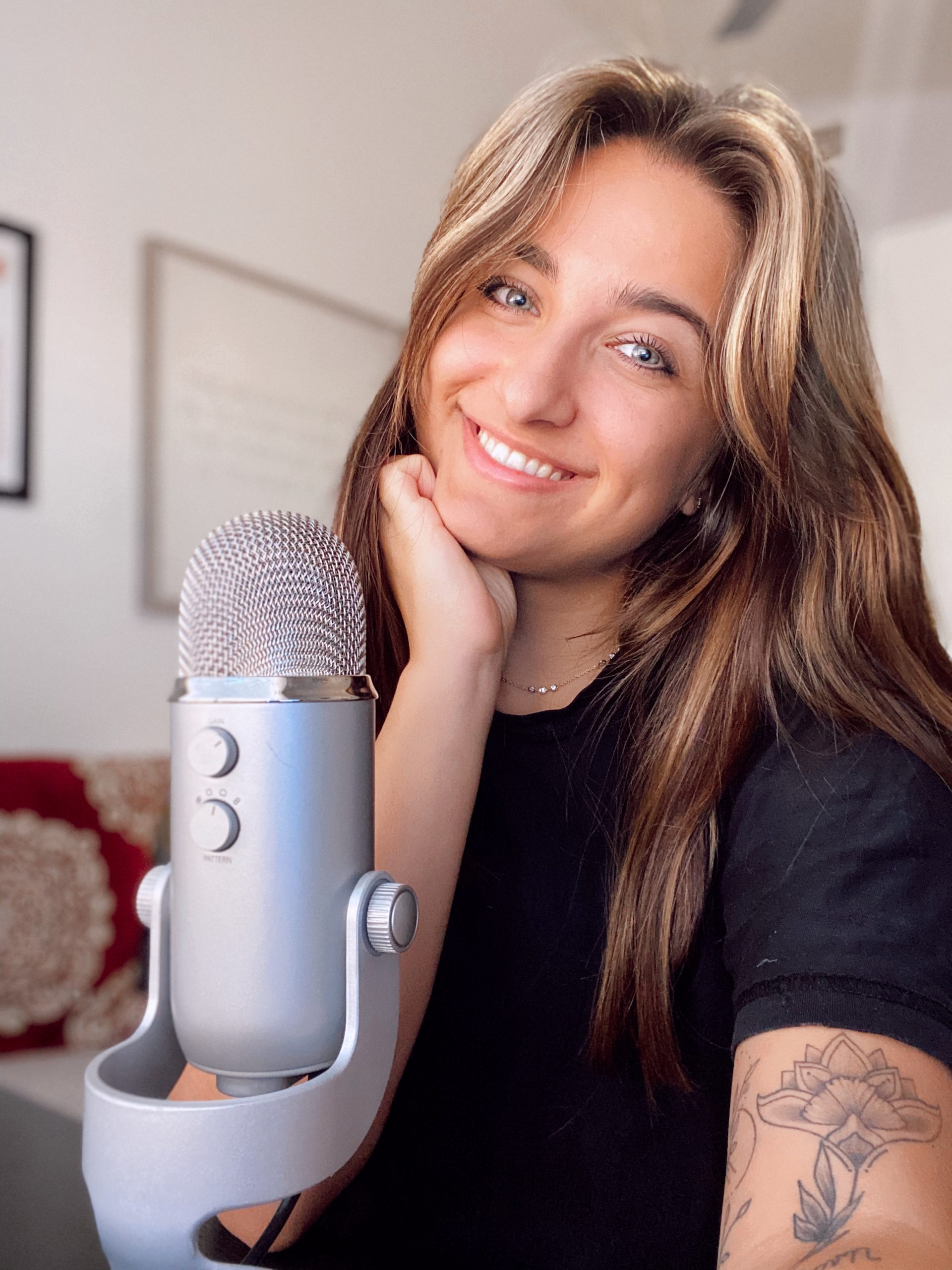 Mary recording marys cup of tea podcast Mary with podcast microphone