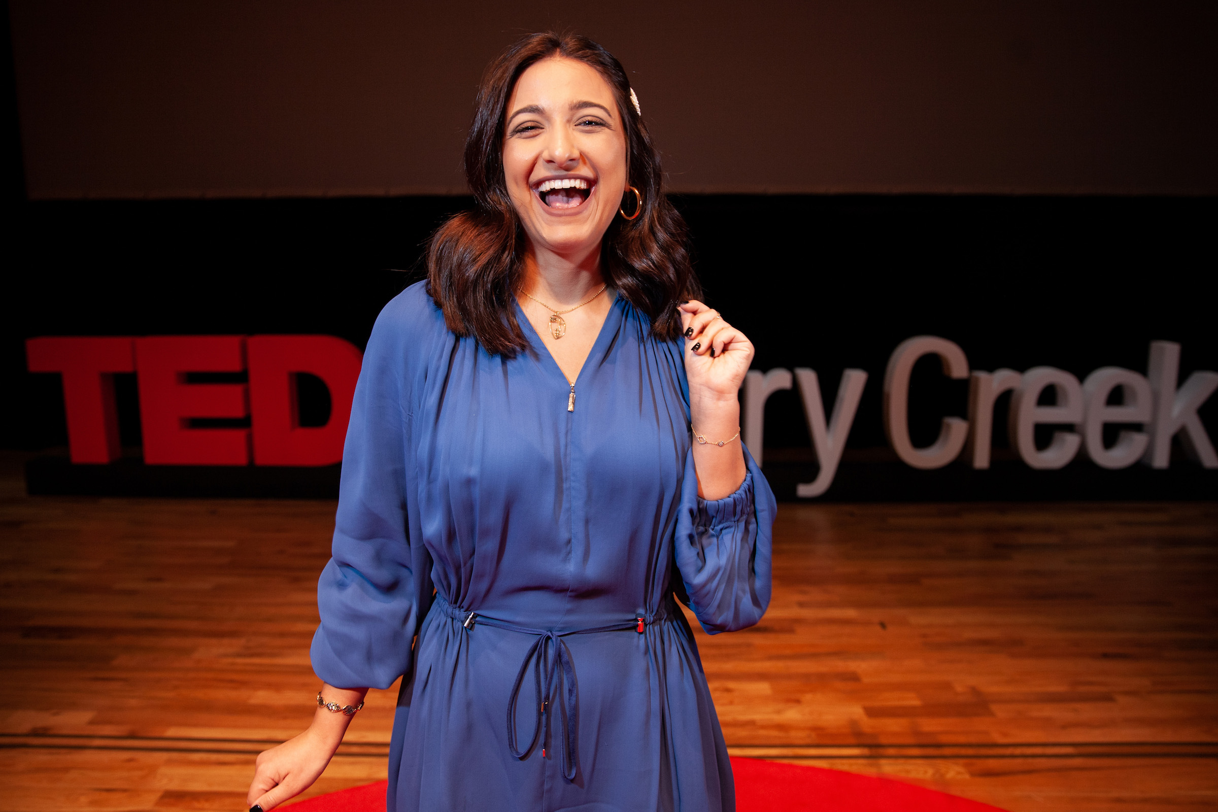 Mary Jelkovsky on TEDx stage Mary Jelkovsky TEDx talk headshot